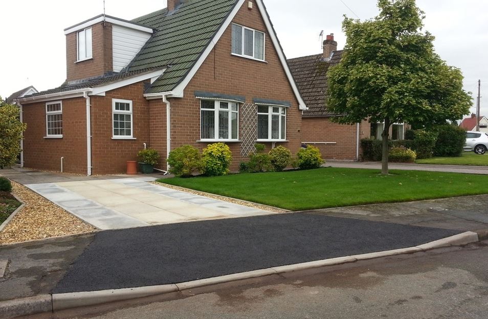 Completed dropped kerb and new driveway installed by Drop Kerbs UK